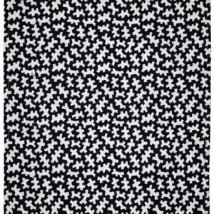 Heikki Orvolan "Yleispätevä" -kuvio mustavalkoisena keittiöpyyhkeessä